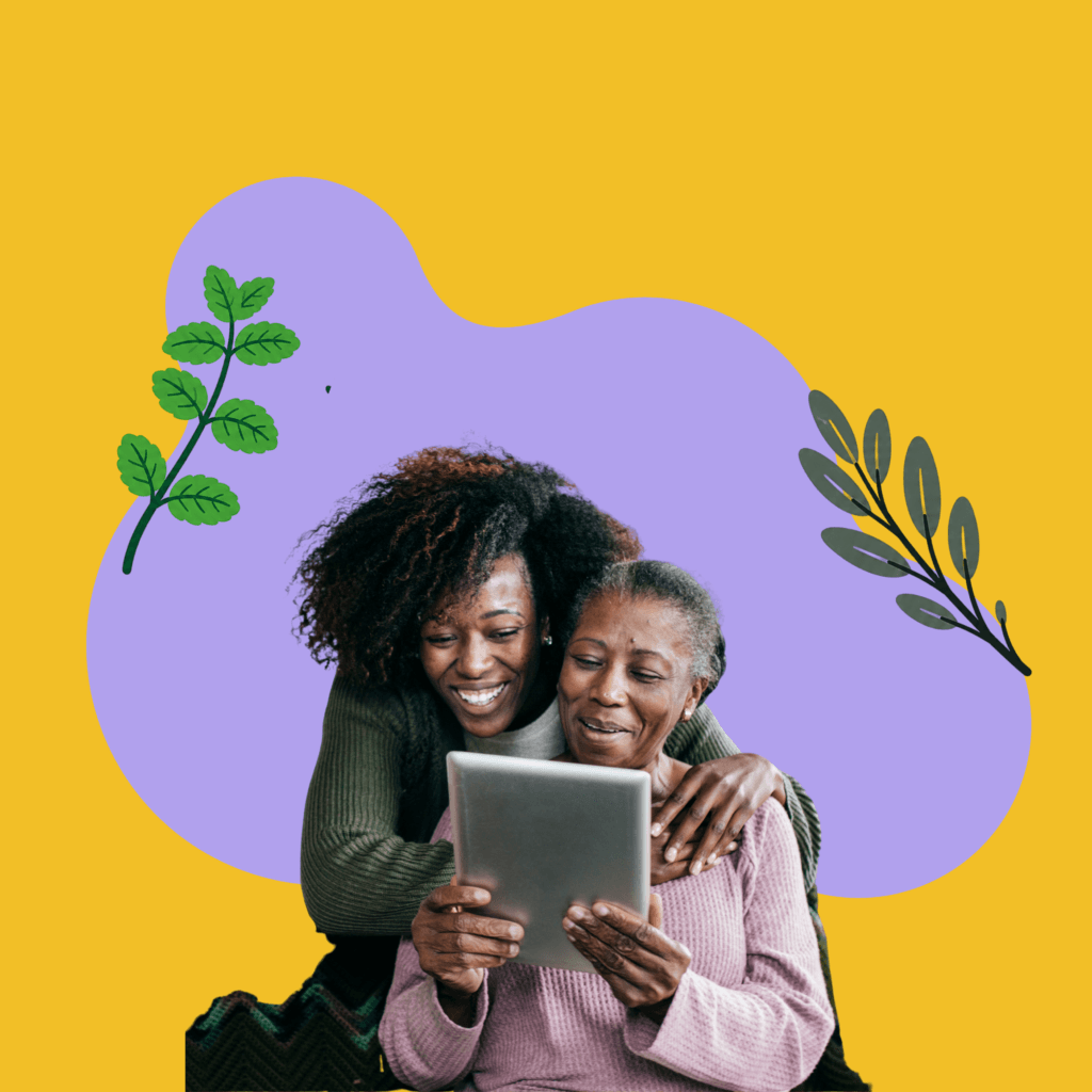 Two Black women smiling and looking at a tablet together, one with her arm around the other in a warm embrace. Set against a lilac organic blob shape on a golden yellow background, with illustrated green and dark botanical leaf branches on either side.